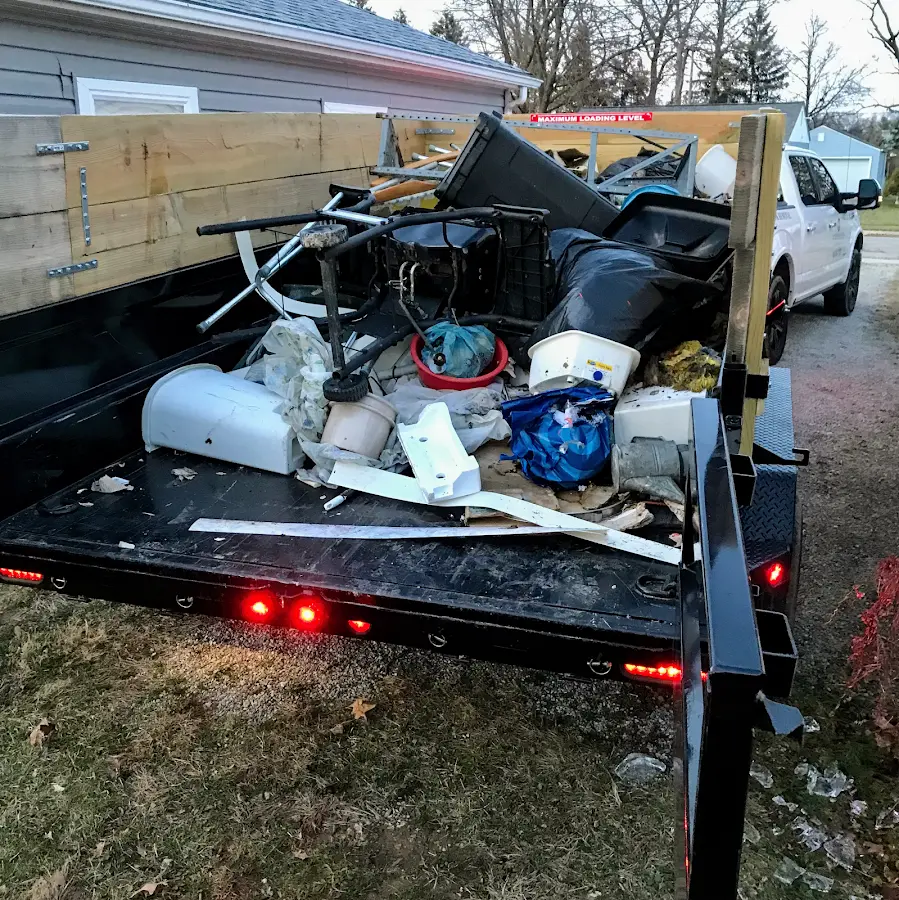 Roll-off dumpster delivered to a residential driveway in Fox Island