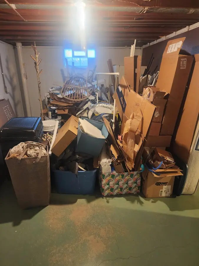 Roll-off dumpster container at job site for 20 Yard Dumpster Rental in Fox Island